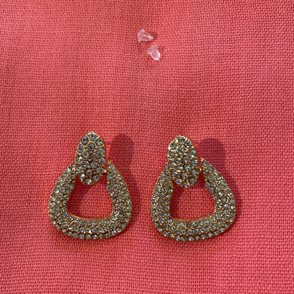Gold tone post earrings with rhinestones